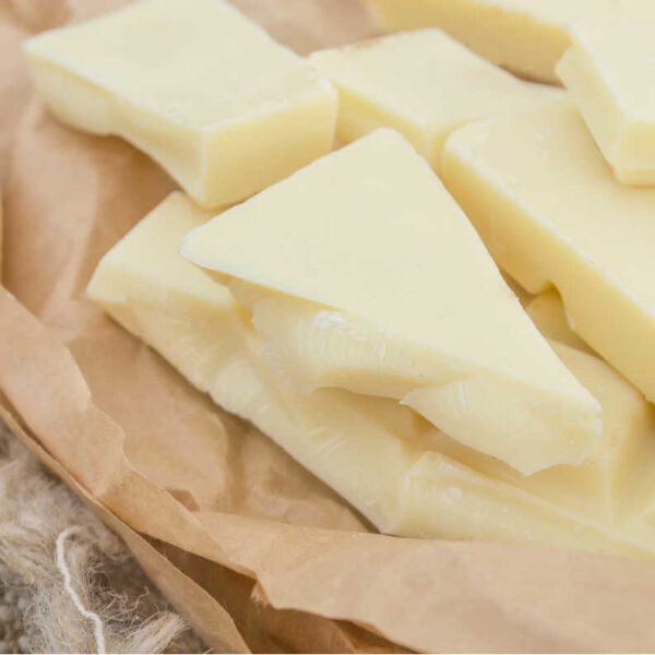 White chocolate snack on brown color paper. Palm Oil-Based Alternatives to Cocoa Butter in Chocolates