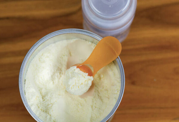 preparation of mixture baby feeding on wooden background top vie Milk Powder Supplier for Afghanistan