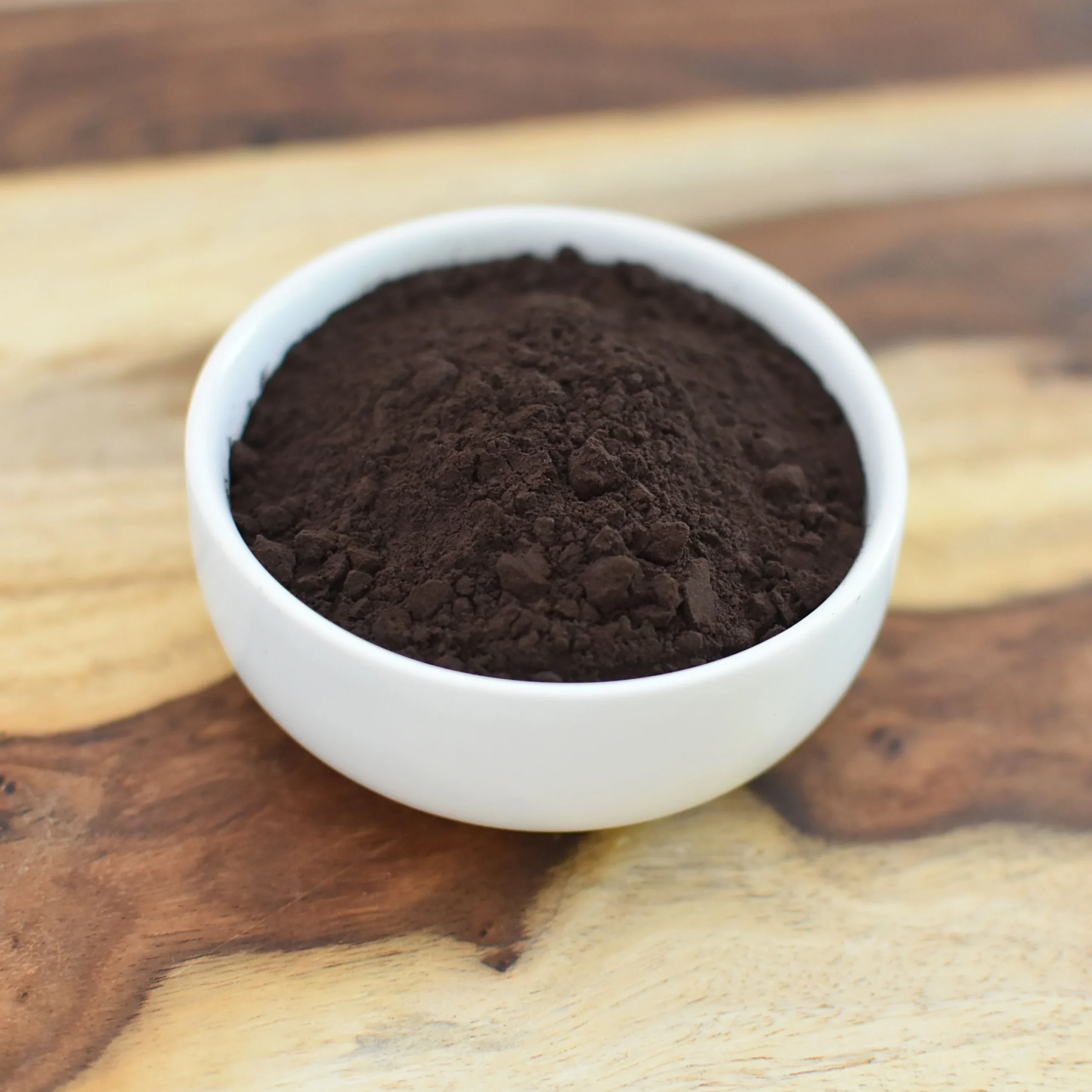 Can black cocoa powder significantly reduce formulation cost?