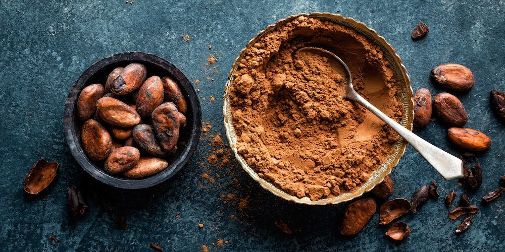 Why does light brown cocoa require higher dosage?