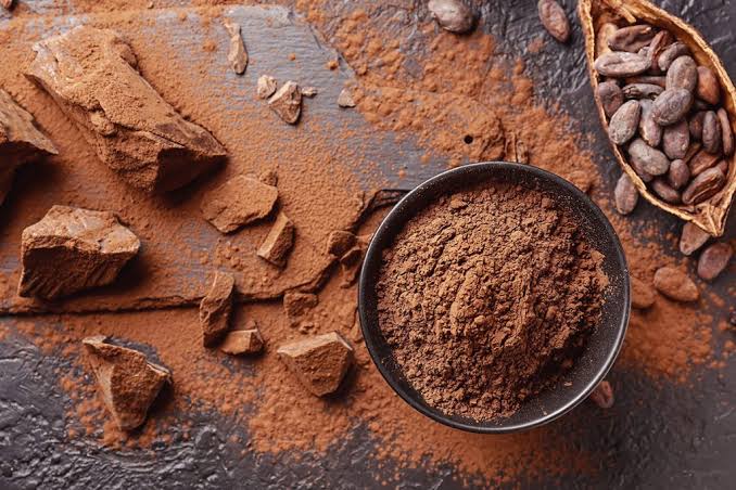 Does cocoa powder particle size affect dosage?